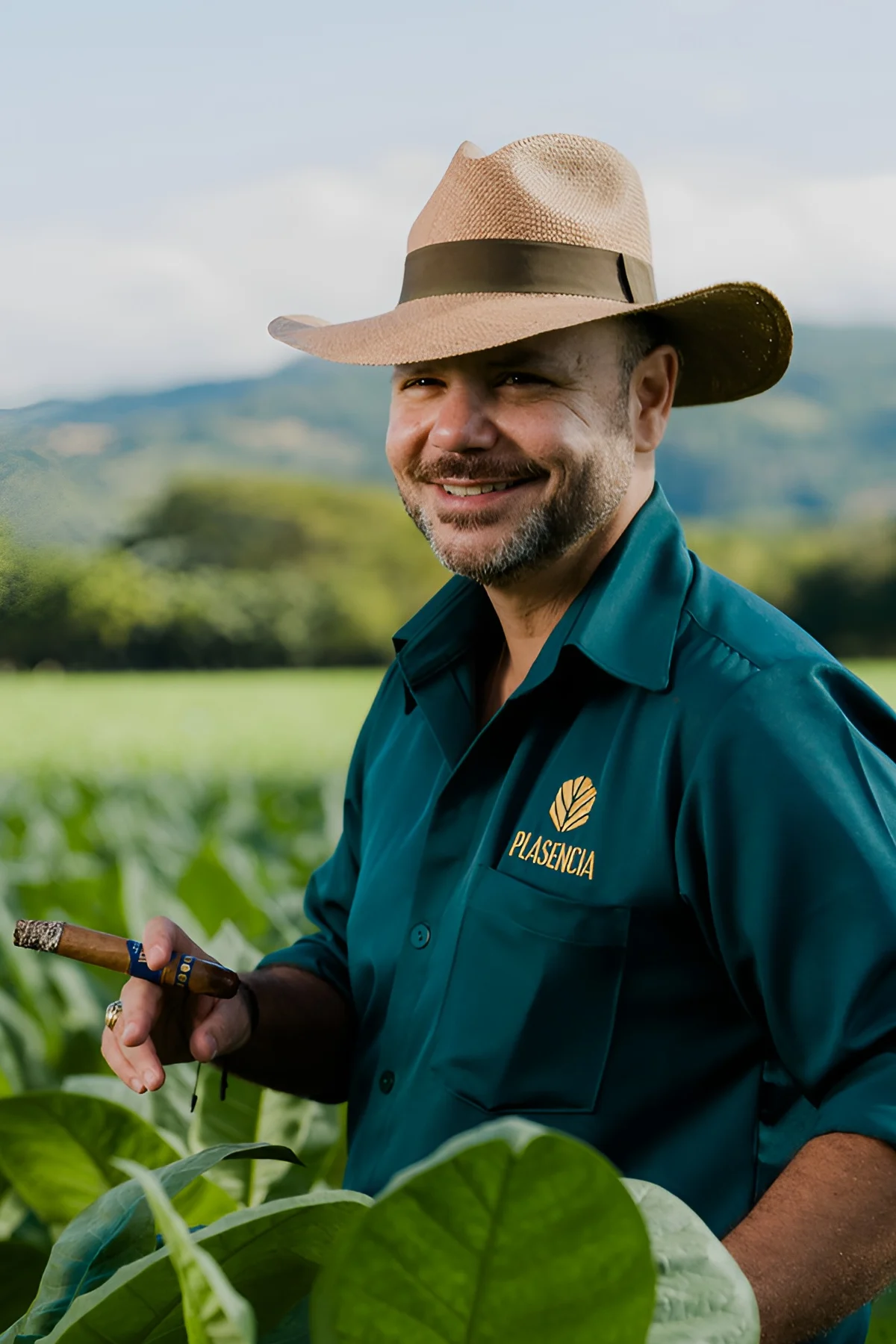 Néstor Andrés Plasencia Torres in a tobacco field, a Reserva Original in his hand