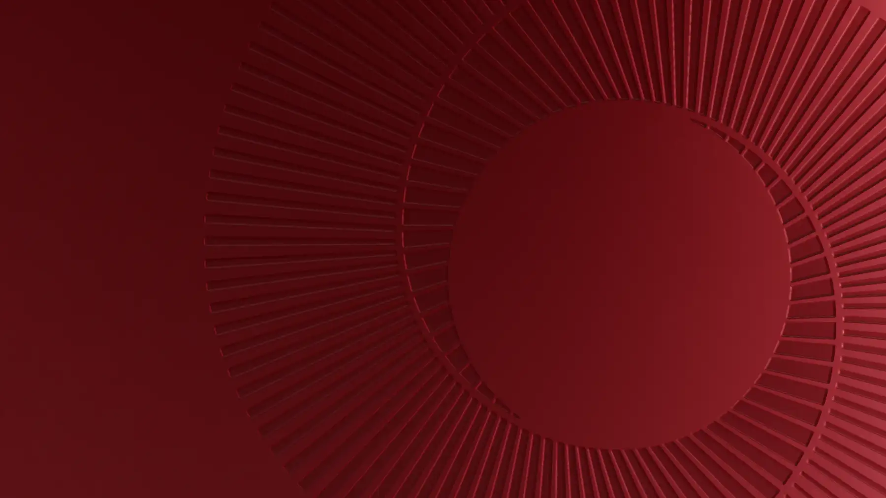 A crimson set carved with the concentric spiral of a goat’s horn