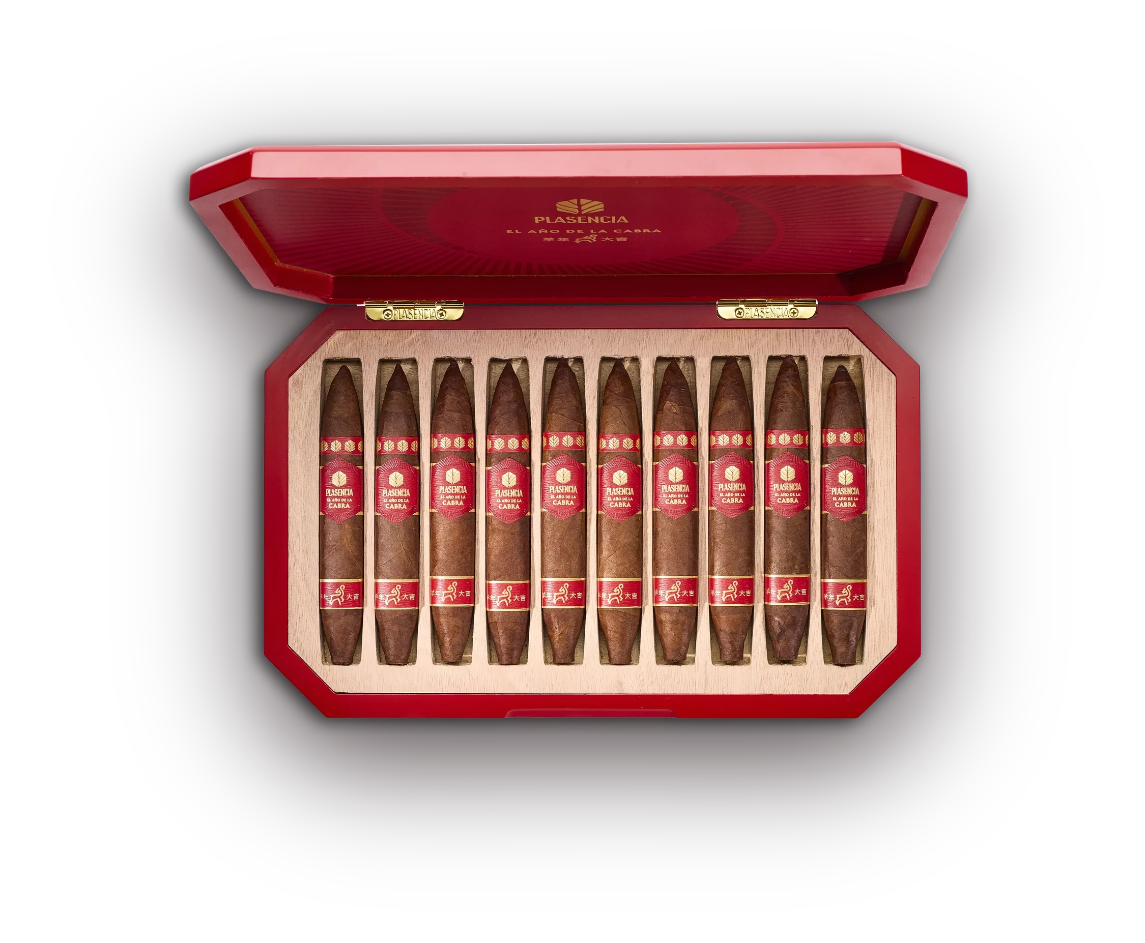 An open box of El Año de la Cabra, ten Perfecto Figurados under the red lacquered lid